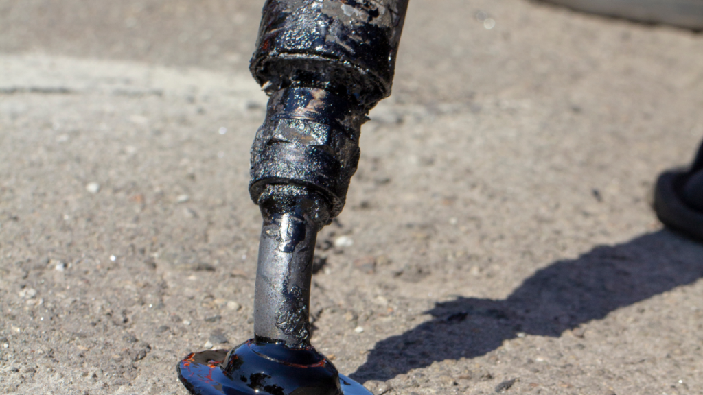 figure shows bitumen oozing out from pipe